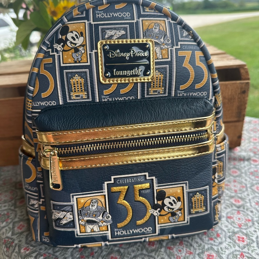 Loungefly Disney Parks 35th Anniversary Navy and Gold Backpack